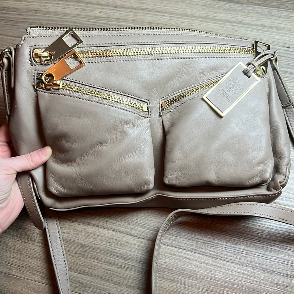 Vince Camuto neutral beige bag with gold accents